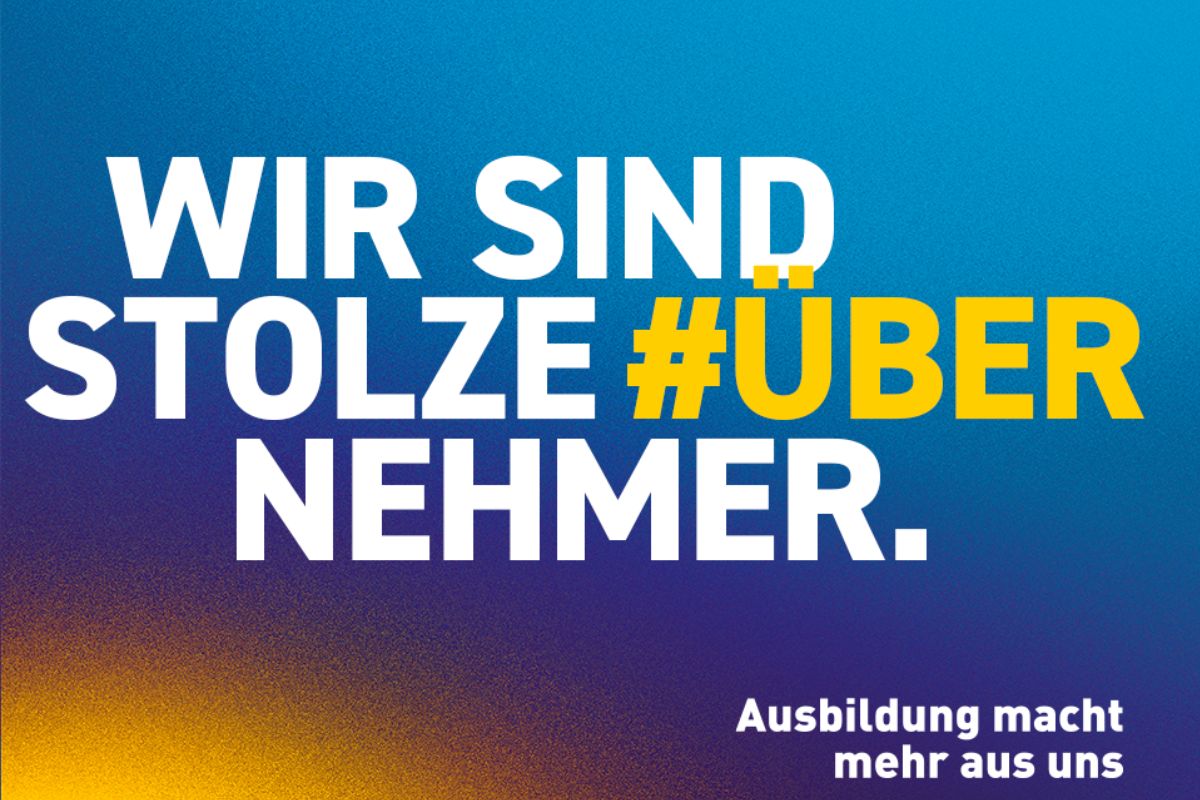 Bild zeigt die Aufschrift: ,,Wir sind stolze Übernehmer``.